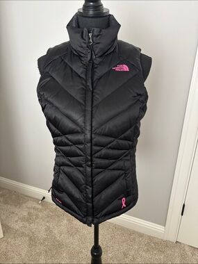 The North Face Black Puffer Vest with Pink Logo Accents